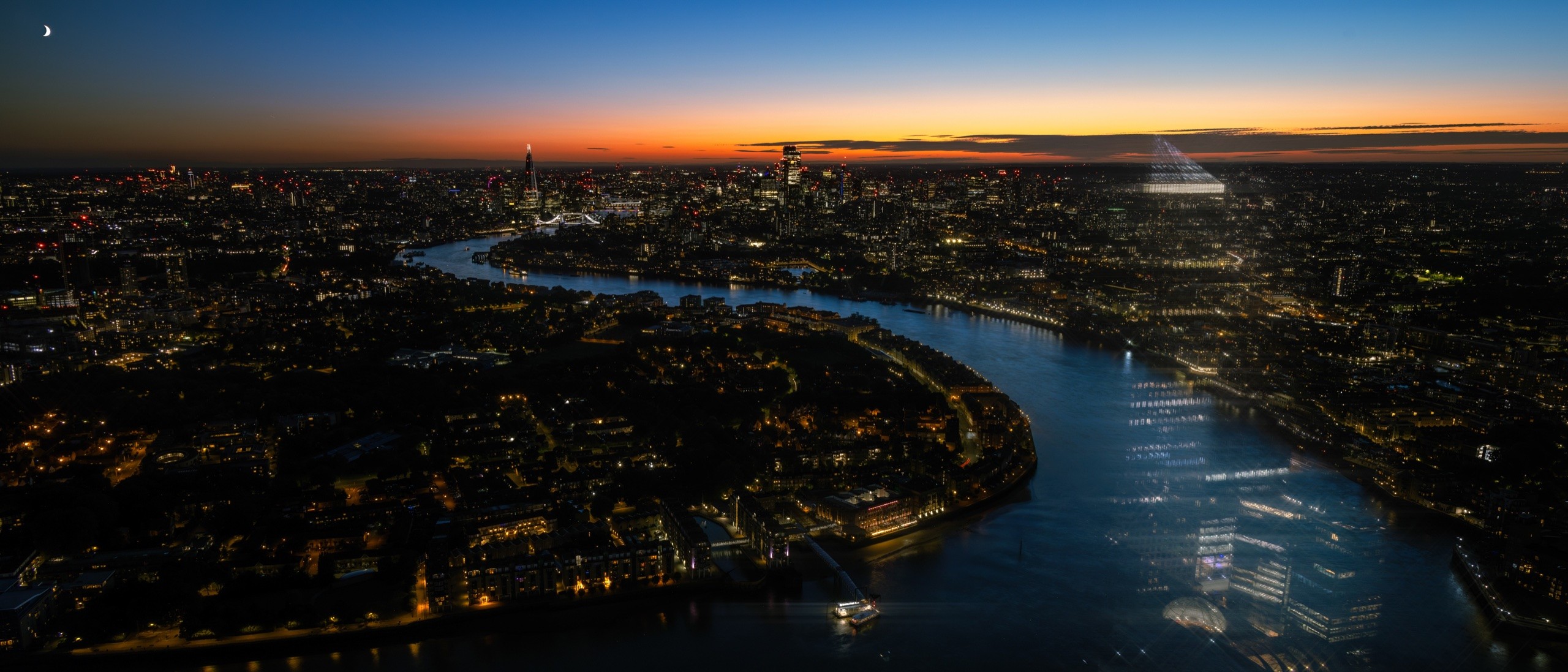 London and the Thames beneath an orange evening sky